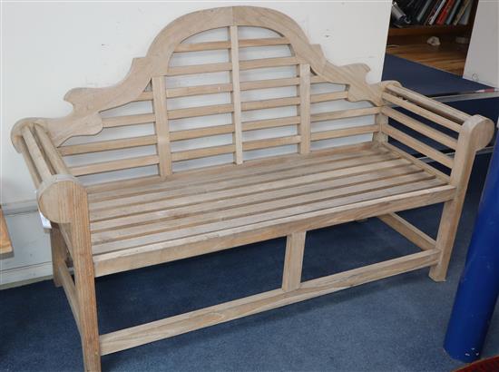 A Lutyens style teak garden bench W.165cm